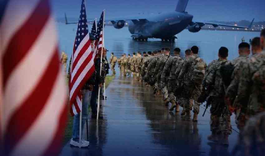 US vows 'all necessary actions' after drone strike, Qatar fears impact on Gaza hostage talks